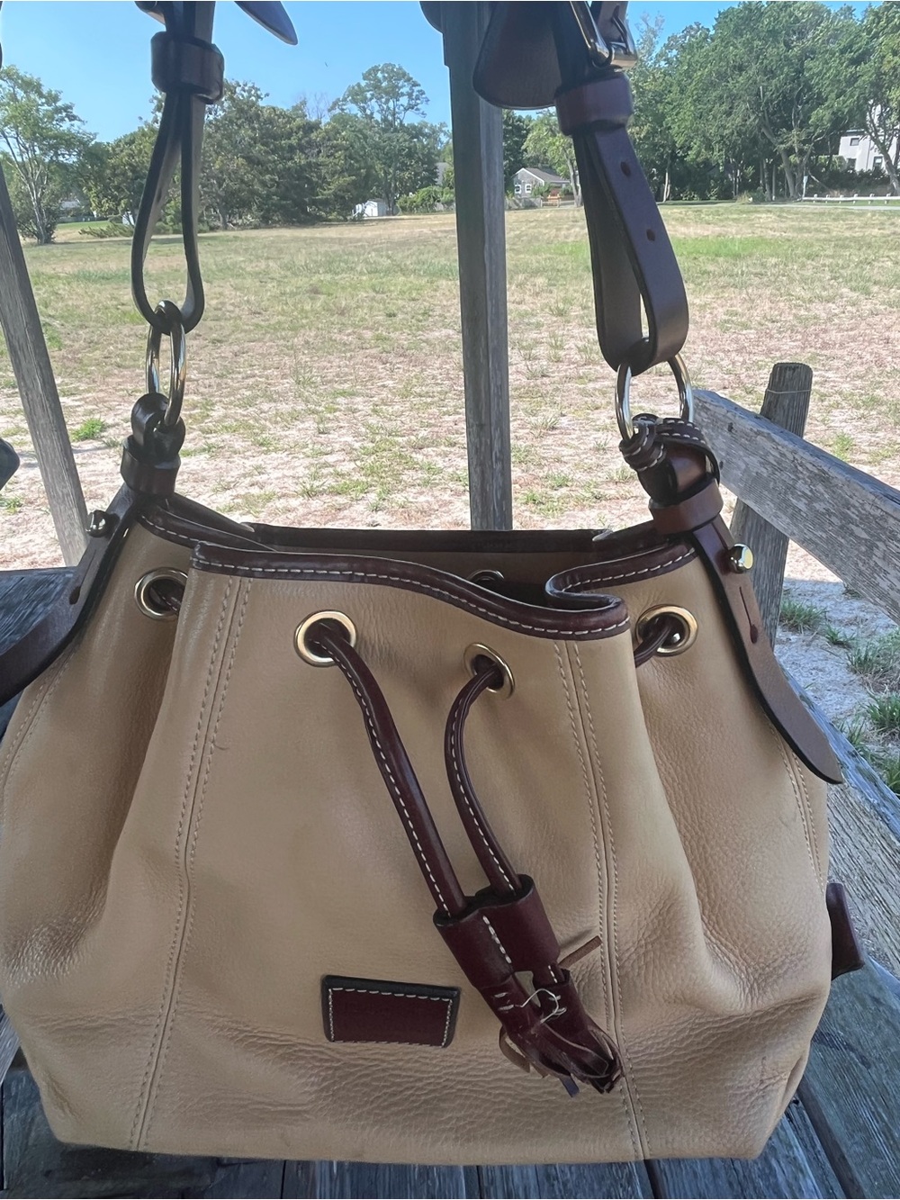 DOONEY AND BOURKE Tan Leather Drawstring Shoulder Bag with Dark Brown Trim.clean